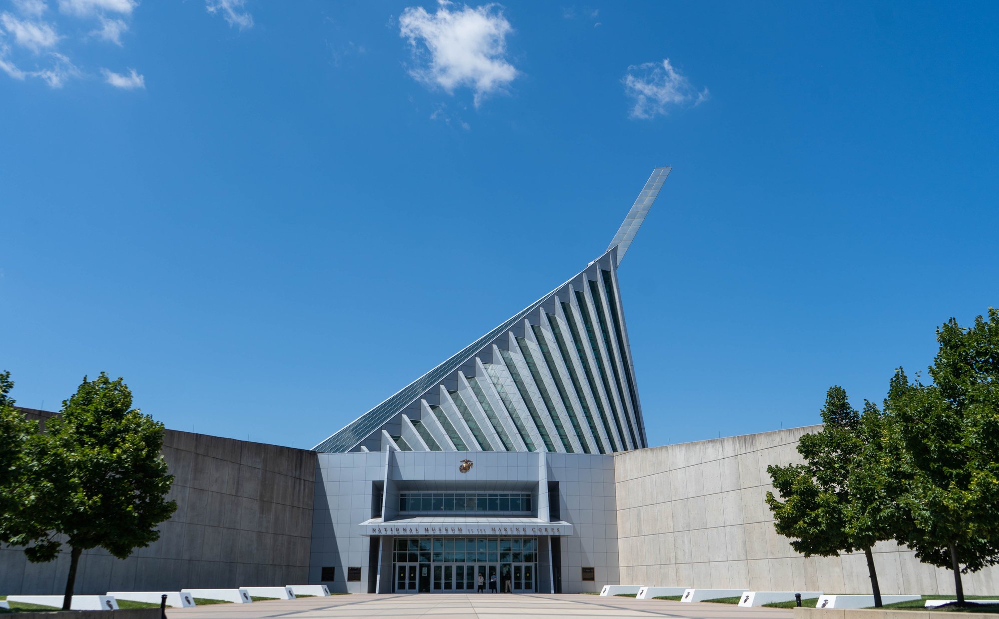 Front entrance of the National Museum of the Marine Corps in Quantico, Virginia, showcasing the museum’s iconic spire and welcoming visitors to its world-class exhibits